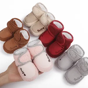 Variety of colorful plush baby winter boots with Baby embroidery and warm lining.