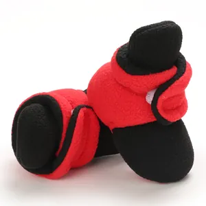 Soft fleece baby booties with red and black color-blocking for the autumn and winter.