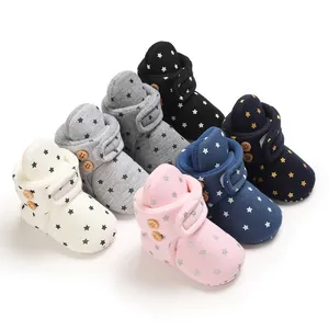 Collection of colorful star-patterned baby winter booties with soft soles and warm lining.