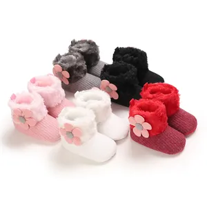 Cozy infant winter snow boots with soft fur lining and flower decoration for babies