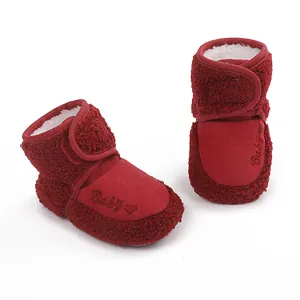 Soft red baby winter boots with warm fleece lining and sweet heart embroidery details