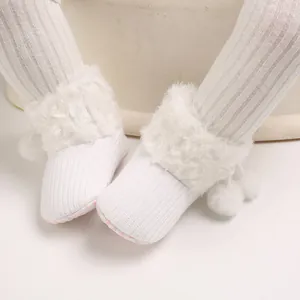 White knitted baby princess shoes with fur trim and cute pom-poms for 0-1 year old