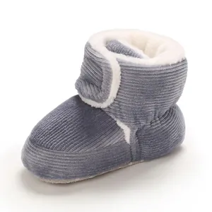 Warm grey corduroy baby snow boots featuring white fleece lining and soft non-slip sole