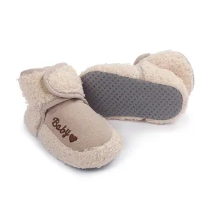 Detailed view of beige sherpa fleece baby winter boots featuring a soft anti-slip sole