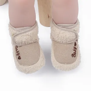 Cozy sherpa baby winter boots with heart embroidery and secure velcro strap closure