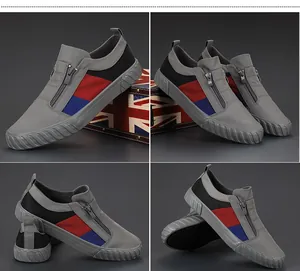 Mehrwinkelansicht von grauen Herren-Sneakern im Colorblock-Design mit Reißverschluss.