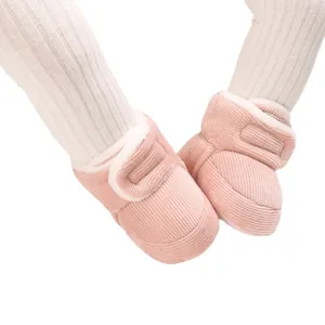 Warm pink baby corduroy snow boots with soft fleece lining and secure Velcro straps