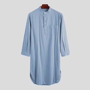 Men's light blue long-sleeved kaftan robe with mandarin collar and button detail