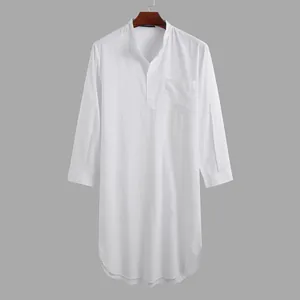 Detail view of men's white long sleeve button-up tunic with a curved hem