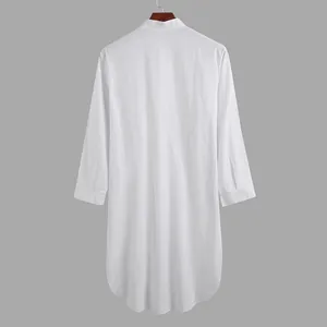 Rear view detail of a classic white long-sleeved men's ethnic robe with curved hem