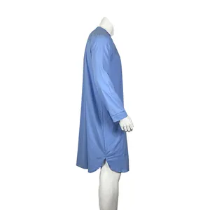 Side view of men's blue traditional long-sleeved robe shirt on a white mannequin base