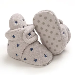 Cozy baby fleece booties with star patterns and anti-slip soles for winter warmth.