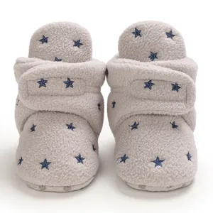 Soft grey fleece baby snow boots featuring embroidered blue star pattern and velcro