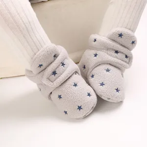 Soft sole warm fleece baby boots featuring blue star pattern for winter infant wear