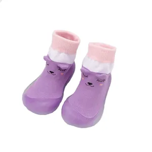 Purple cartoon baby knitted walker shoes with soft rubber soles for infant boys and girls.