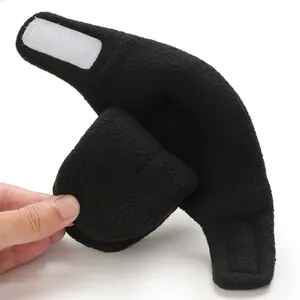 Soft fleece black baby bootie detail showing flexible soft sole and warm winter texture.