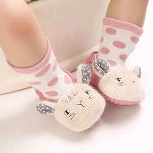 Close-up detail of cute cartoon animal baby soft-sole warm socks for 0-1 year infants