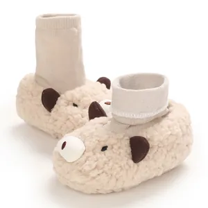 Cute cream-colored soft plush cartoon animal baby booties with ribbed knit ankle cuffs
