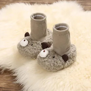 Detailed view of cozy cartoon capybara baby snow boots with soft knit cuffs for winter warmth