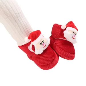 Red plush Santa Claus baby winter boots with soft non-slip soles for festive warmth