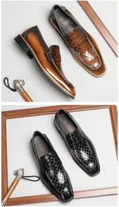 Detailed macro view of men's square-toe embossed leather business loafers in brown and black