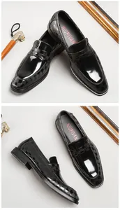 Detail view of black patent leather loafers for men with checkered embossed pattern