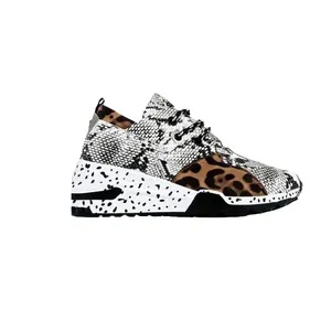 Damen Sneaker mit Plateausohle und exklusivem Schlangen- sowie Leopardenmuster
