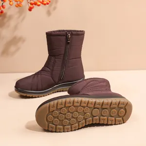 Warm brown waterproof snow boots for women with side zipper and non-slip sole