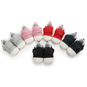 Diverse colors of infant walking shoes with non-slip rubber soles and velcro straps