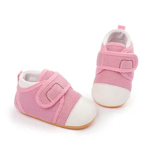 Detailed view of pink breathable mesh baby walking shoes with soft rubber soles