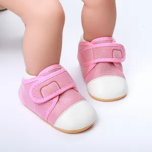 Detailed view of pink breathable mesh baby walking shoes with adjustable strap