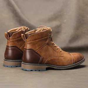 Vue détaillée de bottines de travail marron pour hommes avec fermeture éclair et semelle