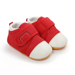 Red baby walking shoes with breathable mesh and non-slip rubber soles for toddlers