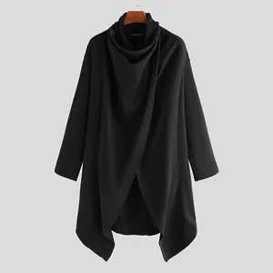 Detail view of men's black punk cloak coat featuring irregular hem and draped high neck design