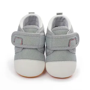 Frontal detail view of breathable mesh baby walking shoes with adjustable velcro straps.
