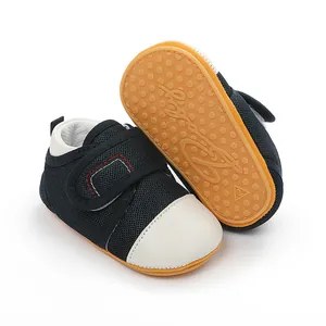 Detail of breathable mesh baby shoes with non-slip yellow rubber soles