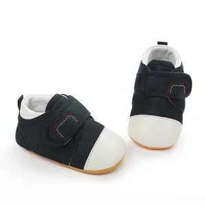 Breathable navy mesh baby walking shoes with white toe cap and non-slip rubber sole