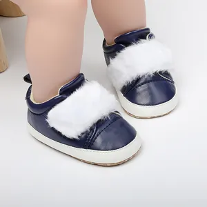 Navy blue baby pre-walking shoes with soft white faux fur trim detail