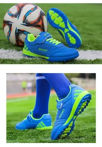 Detailed view of breathable blue mesh kids soccer shoes with velcro straps on turf