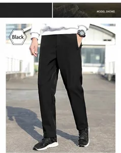 Detail view of men's black athletic casual pants showing the straight fit and fabric texture.