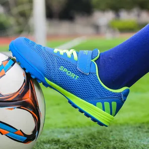 Breathable mesh children's soccer shoes with Velcro design for outdoor turf training
