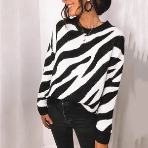 Cozy black and white zebra print crew neck sweater for stylish autumn and winter wear.