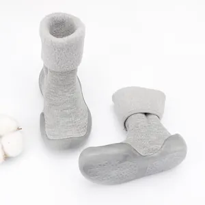 Gray lamb wool baby walker shoes with non-slip rubber soles for winter floor wear
