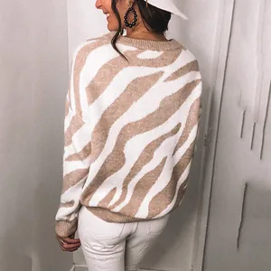 Detailed back view of a cozy zebra print knit sweater with a relaxed crew neck fit.