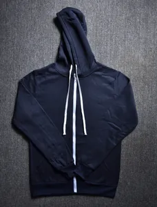 Close-up detail of navy blue men's zip-up hoodie featuring white drawstring and pockets