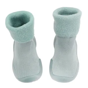 Winter lambswool baby sock shoes with warm knitted fabric and soft rubber soles
