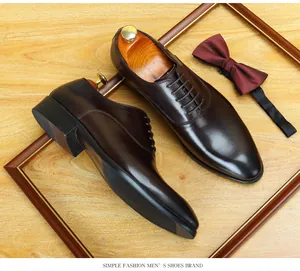 Chaussures richelieu classiques en cuir marron foncé avec nœud papillon élégant