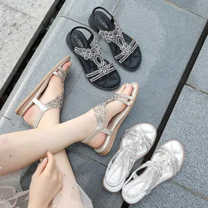 Casual women's flat sandals with rhinestone flower pattern and elastic strap