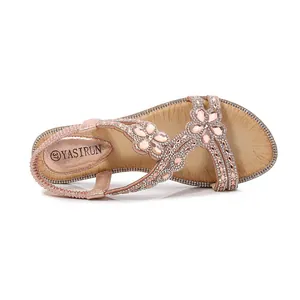 Bohemian rose gold flat sandals with rhinestone flower decoration and elastic back strap