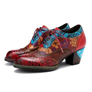 Detailed side view of retro floral print patchwork ethnic style high heels for women.